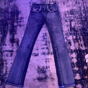 The branding on the back is a little damaged but jeans are in good condition